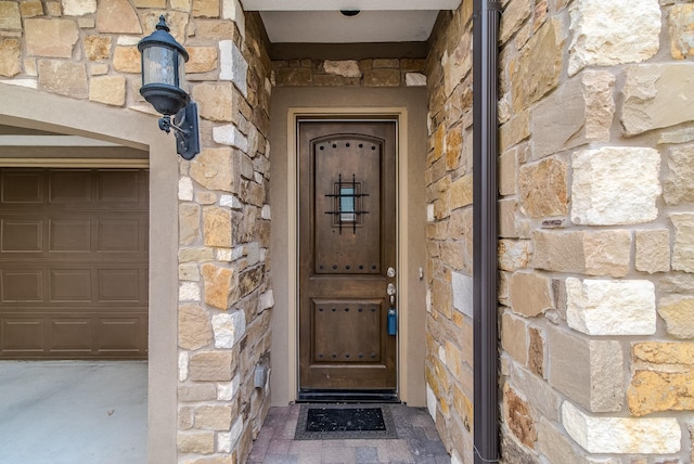 1610 Knox St Unit A, Houston, TX 77007 - property entrance featuring stone siding and a garage