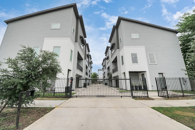 3022 Live Oak St, Houston, TX 77004 - view of concrete surface featuring a gated entry and a gate