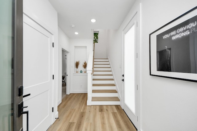 3022 Live Oak St, Houston, TX 77004 - foyer entrance with stairway, light wood finished floors, recessed lighting, baseboards, and plenty of natural light