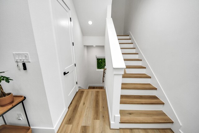 3022 Live Oak St, Houston, TX 77004 - stairs featuring wood finished floors and baseboards