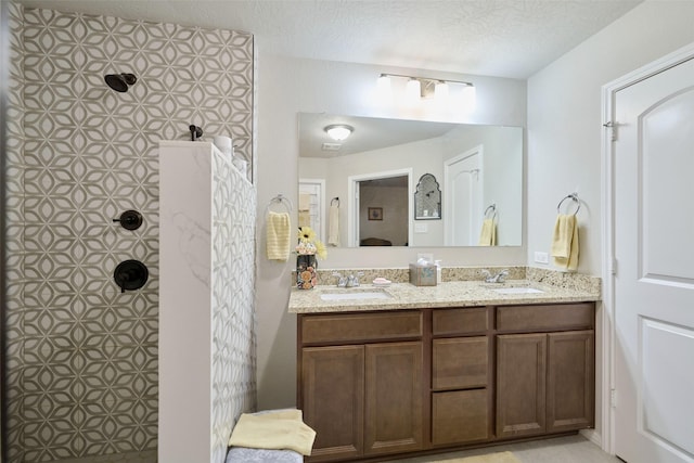 999 Arbor Gln, Conroe, TX 77303 - full bathroom with double vanity and walk in shower