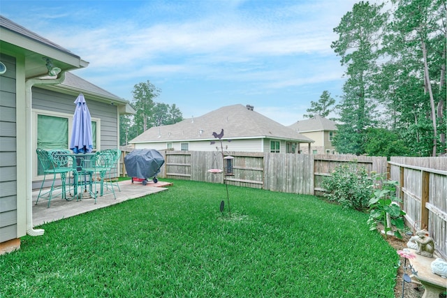 999 Arbor Gln, Conroe, TX 77303 - view of yard featuring a patio