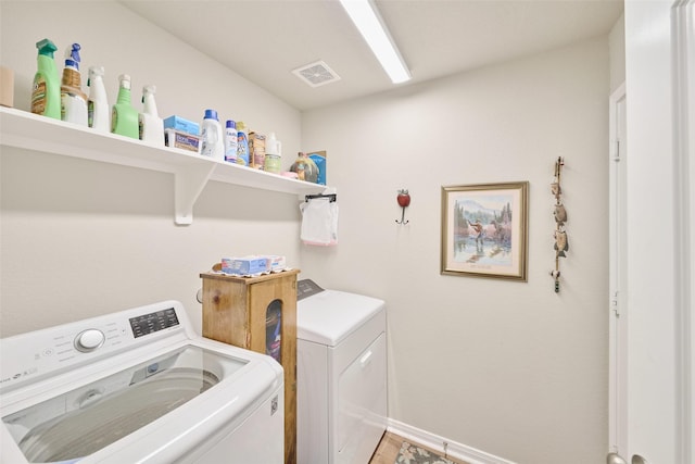 999 Arbor Gln, Conroe, TX 77303 - washroom with washing machine and clothes dryer