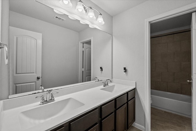 726 Rim Water Dr, Alvin, TX 77511 - bathroom featuring double vanity, toilet, and shower / washtub combination