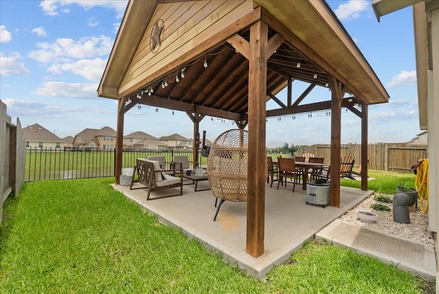 726 Rim Water Dr, Alvin, TX 77511 - view of patio with a gazebo and a residential view