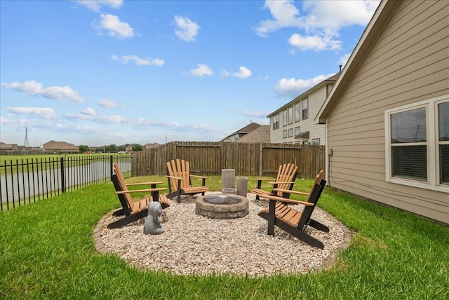 726 Rim Water Dr, Alvin, TX 77511 - view of yard with a fire pit