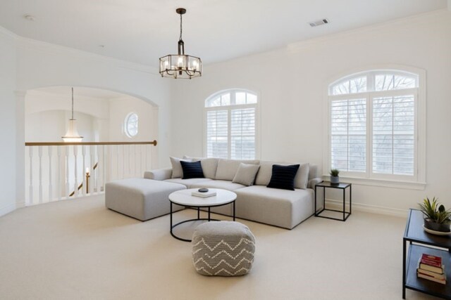 2 Fournace Gardens Dr, Bellaire, TX 77401 - living room featuring carpet flooring, a chandelier, ornamental molding, and baseboards