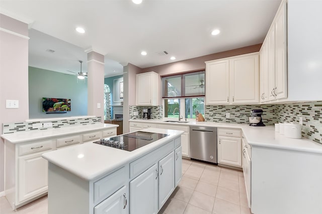 7711 Silent Star Ct, Houston, TX 77095 - kitchen with dishwasher, black electric stovetop, a center island, a sink, and backsplash