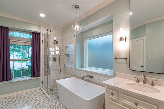 13219 Allysum Ct, Cypress, TX 77429 - bathroom with ornamental molding, a soaking tub, a shower stall, vanity, and healthy amount of natural light