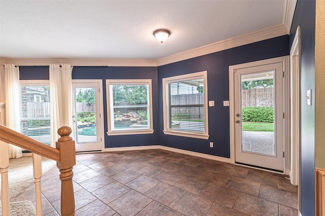 13219 Allysum Ct, Cypress, TX 77429 - entrance foyer featuring baseboards, crown molding, and dark stone finish floors