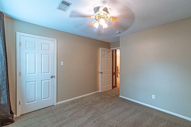 13219 Allysum Ct, Cypress, TX 77429 - unfurnished bedroom featuring carpet, baseboards, and ceiling fan