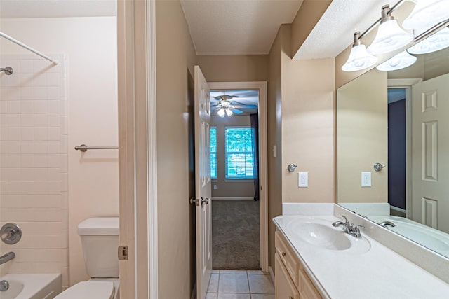 13219 Allysum Ct, Cypress, TX 77429 - full bath featuring toilet, vanity, tile patterned floors, a ceiling fan, and bathing tub / shower combination