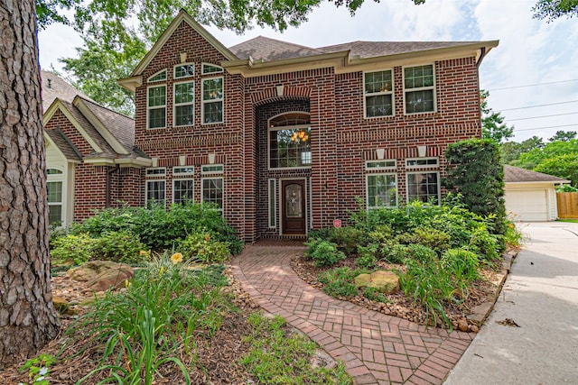 13219 Allysum Ct, Cypress, TX 77429 - view of front of home with brick siding, a garage, and a shingled roof
