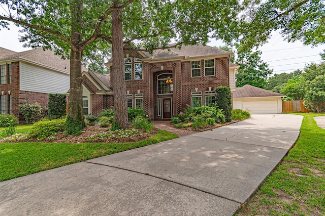 13219 Allysum Ct, Cypress, TX 77429 - view of front of house with brick siding and a detached garage