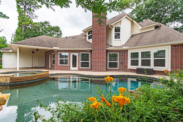 13219 Allysum Ct, Cypress, TX 77429 - view of swimming pool featuring a ceiling fan, a pool with connected hot tub, and a patio
