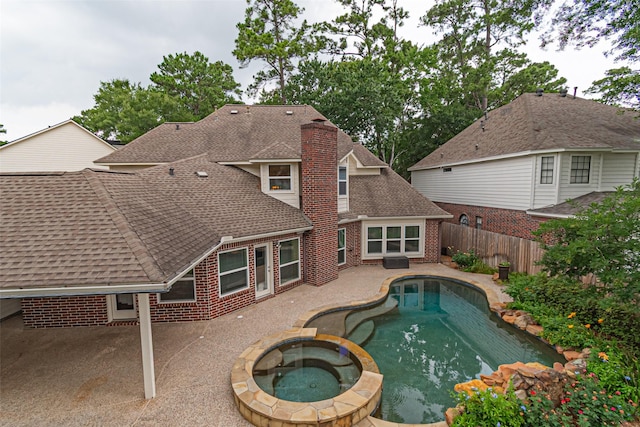 13219 Allysum Ct, Cypress, TX 77429 - view of pool with a patio area, a fenced backyard, and a pool with connected hot tub