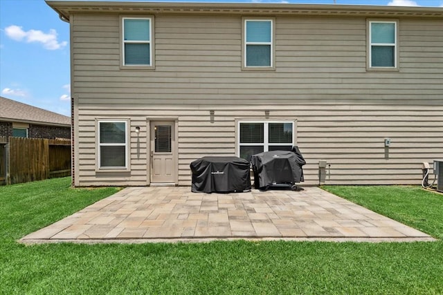 22435 Base Light Dr, Hockley, TX 77447 - back of house with a fenced backyard and a patio