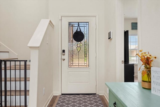 22435 Base Light Dr, Hockley, TX 77447 - foyer featuring stairway and dark wood-style floors
