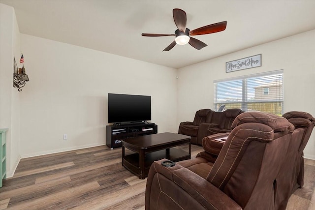 22435 Base Light Dr, Hockley, TX 77447 - living area with a ceiling fan and wood finished floors