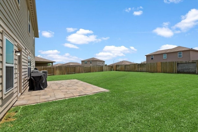 22435 Base Light Dr, Hockley, TX 77447 - fenced backyard with a patio area