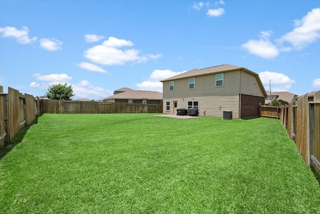 22435 Base Light Dr, Hockley, TX 77447 - back of property featuring a fenced backyard and a patio