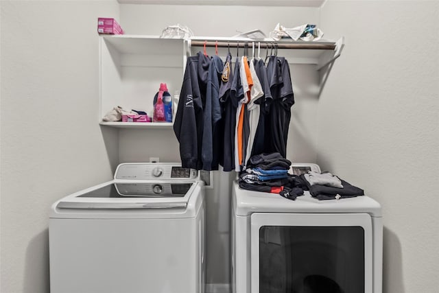 4831 Blue Jacaranda Way, Spring, TX 77373 - laundry room with separate washer and dryer