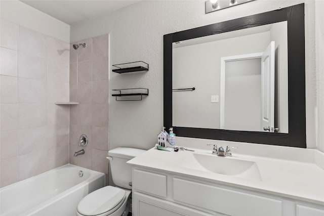 4831 Blue Jacaranda Way, Spring, TX 77373 - bathroom featuring toilet, vanity, shower / washtub combination, and a textured wall