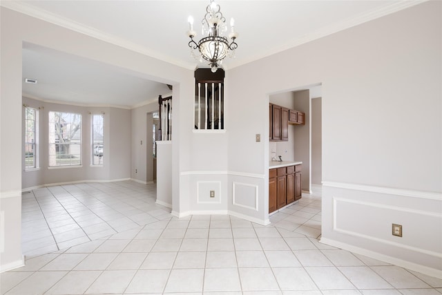 814 Hyacinth Pl, Missouri City, TX 77459 - empty room featuring a chandelier, light tile patterned flooring, crown molding, and baseboards