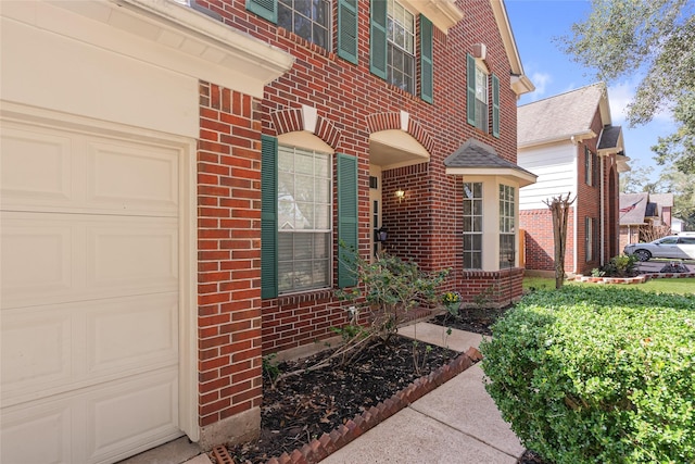 814 Hyacinth Pl, Missouri City, TX 77459 - doorway to property with brick siding and a garage