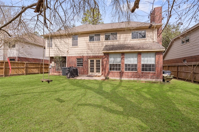 814 Hyacinth Pl, Missouri City, TX 77459 - back of property featuring french doors, a chimney, brick siding, a patio, and central air condition unit
