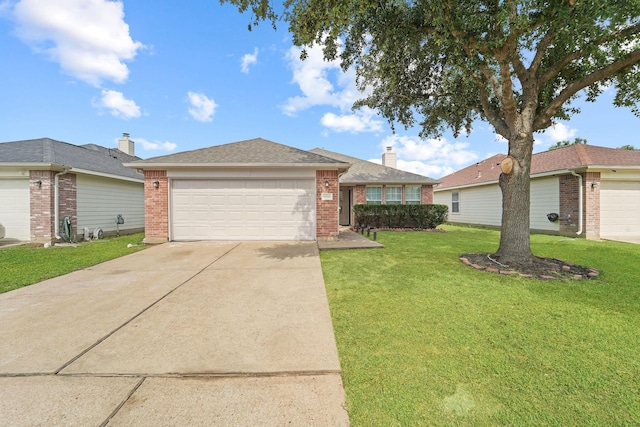 6519 Portlick Dr, Katy, TX 77449 - ranch-style house with brick siding, a front yard, driveway, and an attached garage