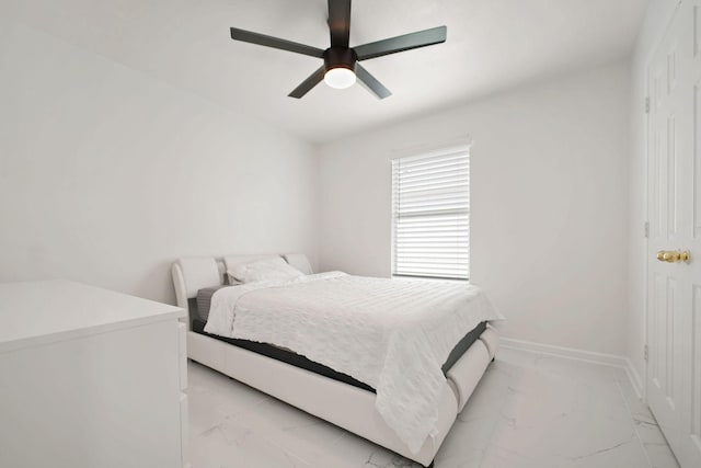 6519 Portlick Dr, Katy, TX 77449 - bedroom with light marble finish flooring and ceiling fan