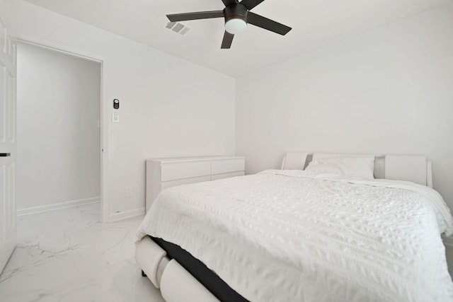 6519 Portlick Dr, Katy, TX 77449 - bedroom featuring light marble finish flooring and ceiling fan