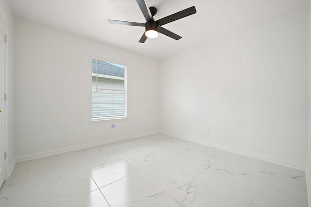 6519 Portlick Dr, Katy, TX 77449 - spare room featuring marble look tiles and ceiling fan