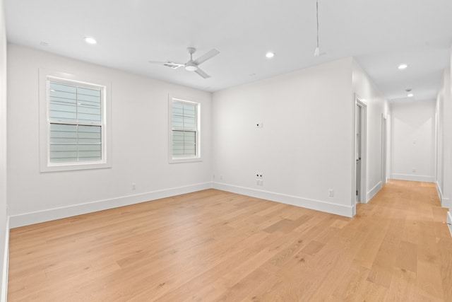 937 Louise St, Houston, TX 77009 - unfurnished room featuring light wood-style flooring, baseboards, recessed lighting, and a ceiling fan