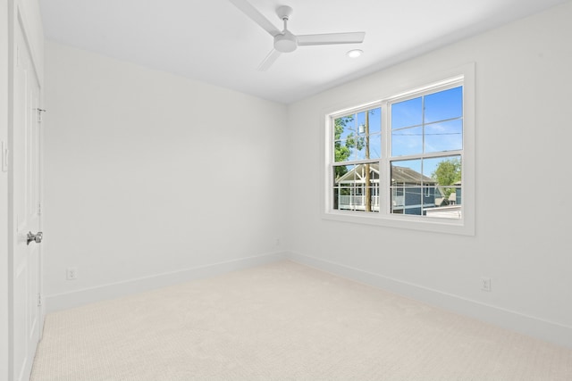 937 Louise St, Houston, TX 77009 - carpeted empty room with baseboards and ceiling fan