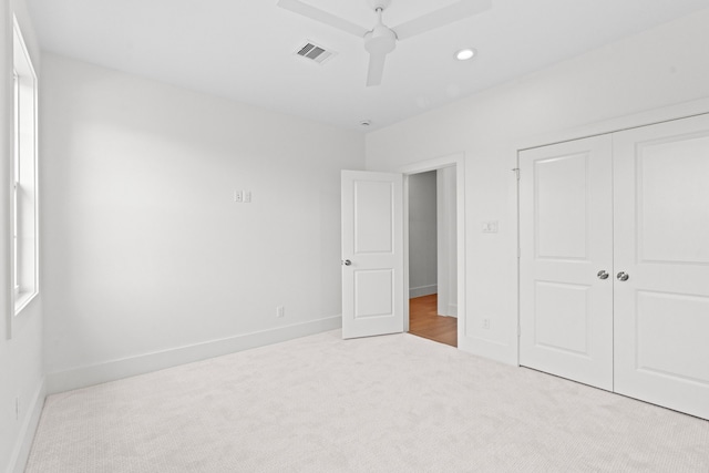 937 Louise St, Houston, TX 77009 - unfurnished bedroom with carpet floors, a closet, baseboards, a ceiling fan, and recessed lighting