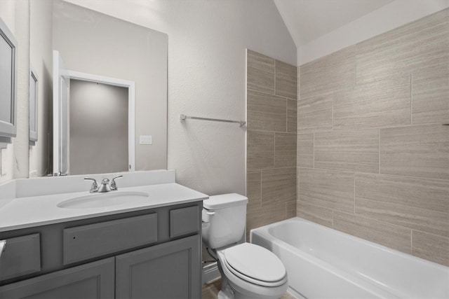 3823 Ponderosa Peak Dr, Spring, TX 77386 - full bath with toilet, vanity, vaulted ceiling, and shower / bath combination