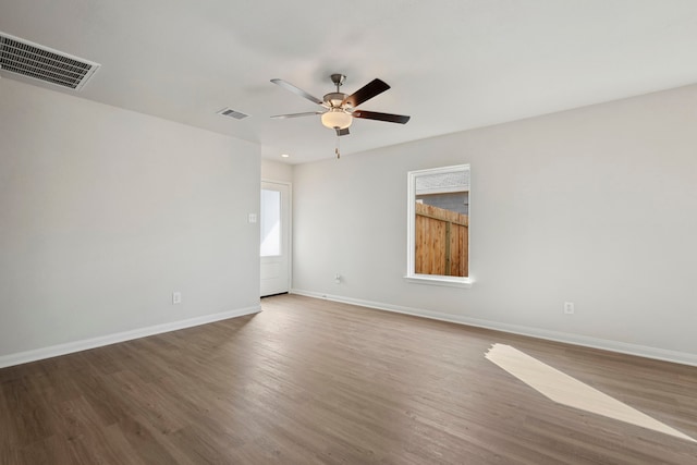 412 Tejas Trl, Waller, TX 77484 - empty room with baseboards, wood finished floors, and ceiling fan