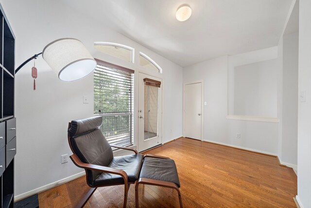 1918 Prospect St, Houston, TX 77004 - living area featuring wood finished floors and baseboards