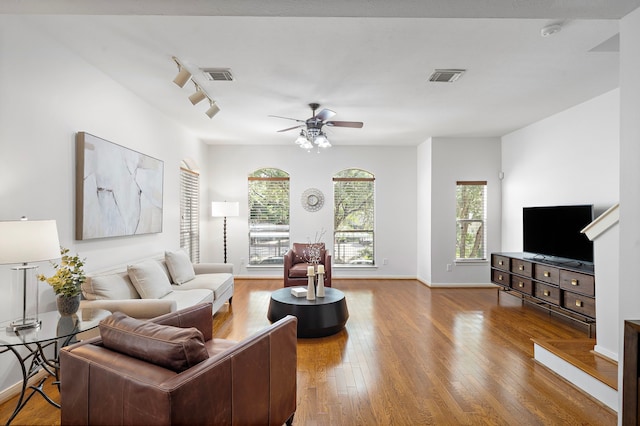 1918 Prospect St, Houston, TX 77004 - living area with ceiling fan and wood finished floors