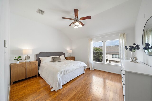 1918 Prospect St, Houston, TX 77004 - bedroom featuring vaulted ceiling, light wood-type flooring, and a ceiling fan