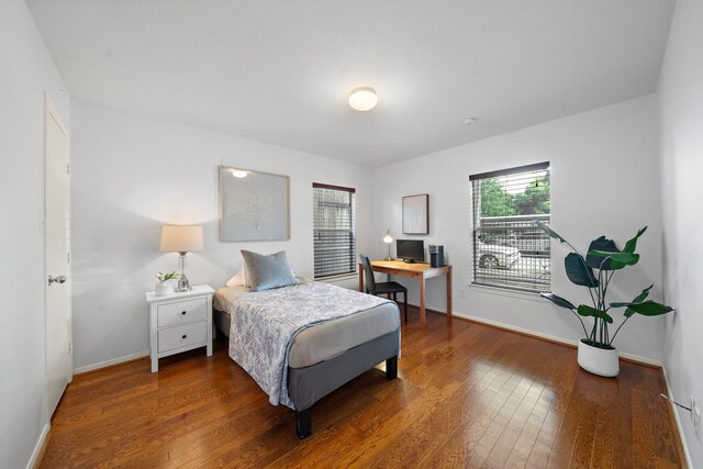 1918 Prospect St, Houston, TX 77004 - bedroom featuring wood finished floors and an office area