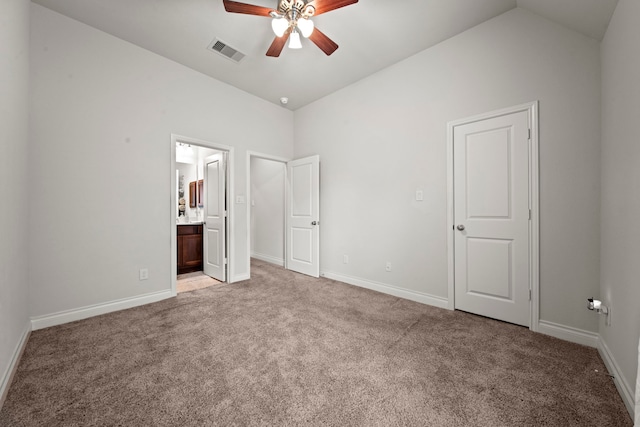 3307 Blueberry Turn Trl, Richmond, TX 77406 - unfurnished bedroom featuring lofted ceiling, light carpet, baseboards, and connected bathroom