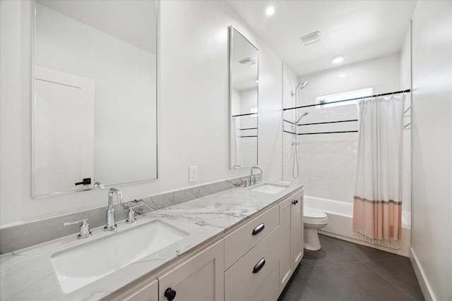 4731 Park Dr, Houston, TX 77023 - bathroom with toilet, double vanity, shower / tub combo with curtain, and tile patterned flooring