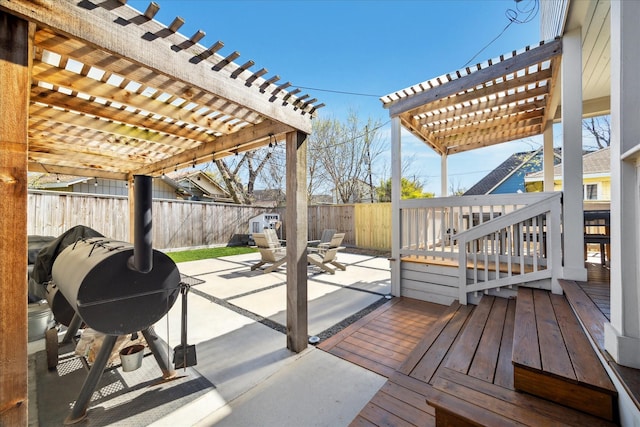 4731 Park Dr, Houston, TX 77023 - wooden terrace featuring a pergola, a fenced backyard, and a patio