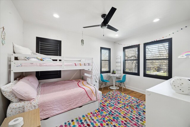4731 Park Dr, Houston, TX 77023 - bedroom featuring wood finished floors, recessed lighting, baseboards, and ceiling fan