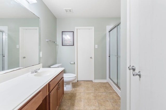 12007 Bach Orchard Trl, Houston, TX 77038 - bathroom with vanity, toilet, and a shower with door