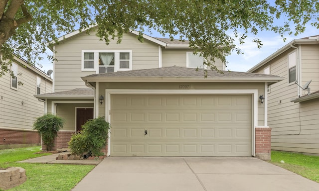 12007 Bach Orchard Trl, Houston, TX 77038 - traditional-style house with driveway, a shingled roof, and brick siding