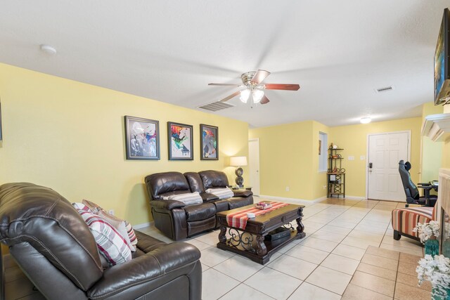 12007 Bach Orchard Trl, Houston, TX 77038 - living room with ceiling fan, light tile patterned floors, and baseboards